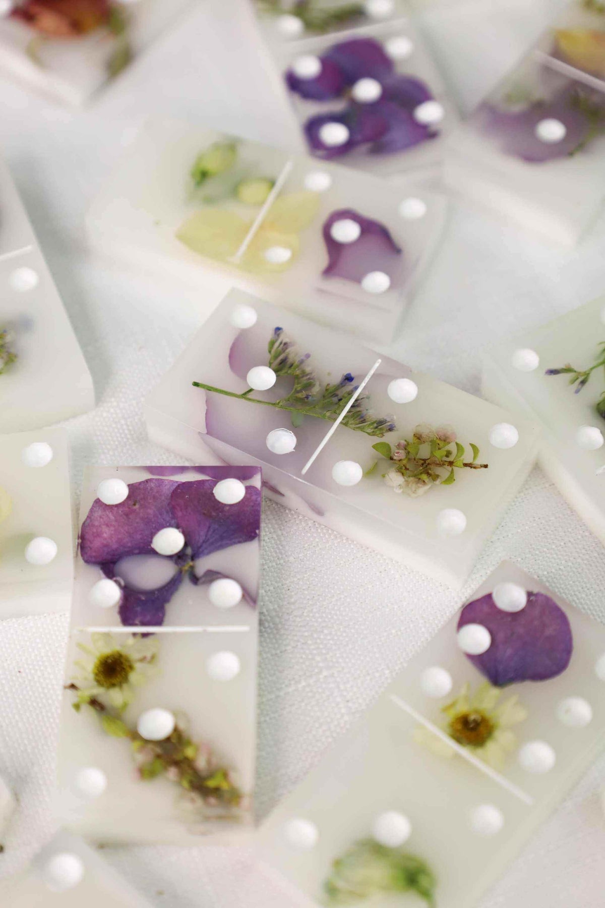 Resin flower domino set with preserved bridal bouquet flowers in white and black backgrounds