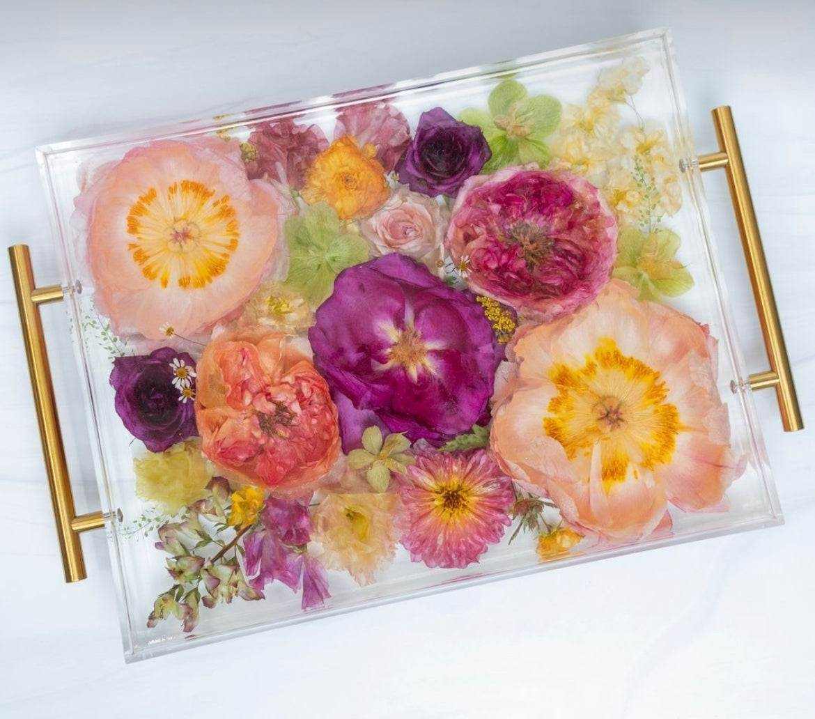 rectangular resin serving tray with preserved colorful flowers encased in clear acrylic