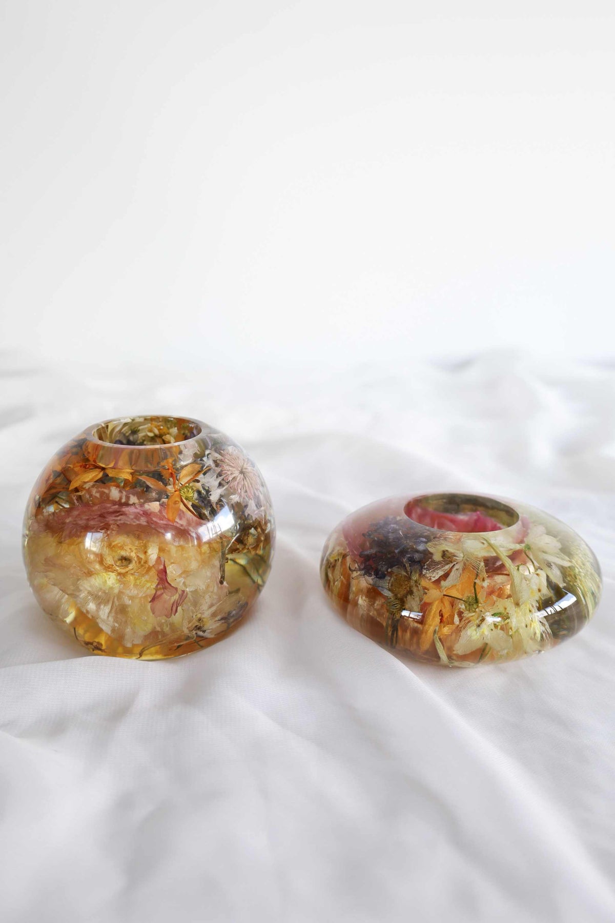 Resin tea light candle holder dome with preserved dried flowers encased inside