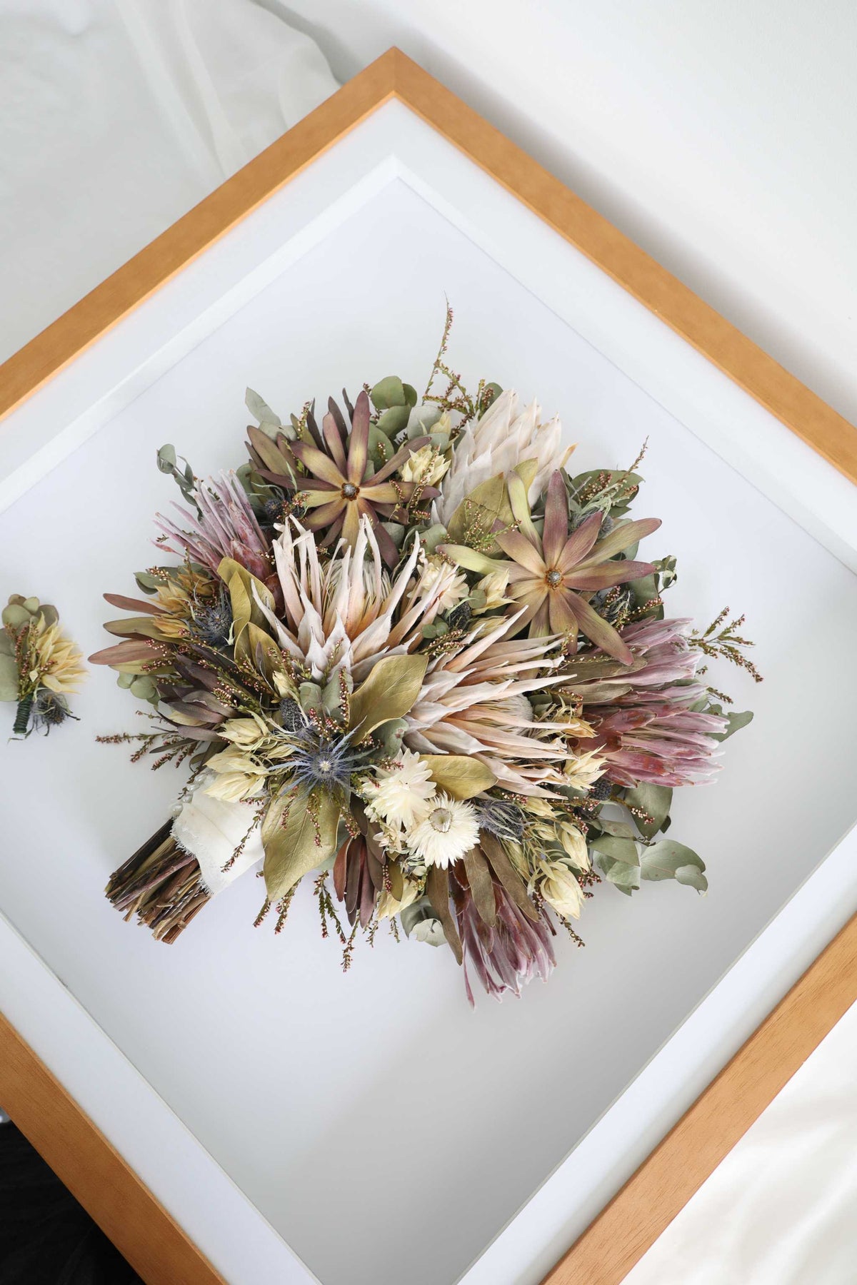 Frame and Resin Trio bridal bouquet preservation package with framed bouquet, resin arch, and diamond print display options
