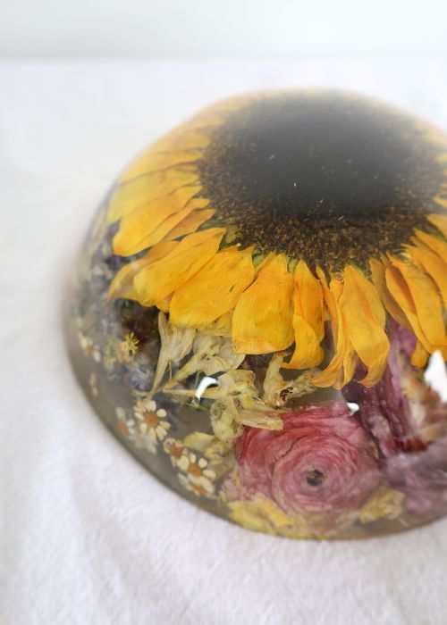 Custom resin paper weight with preserved bridal bouquet flowers in half dome shape
