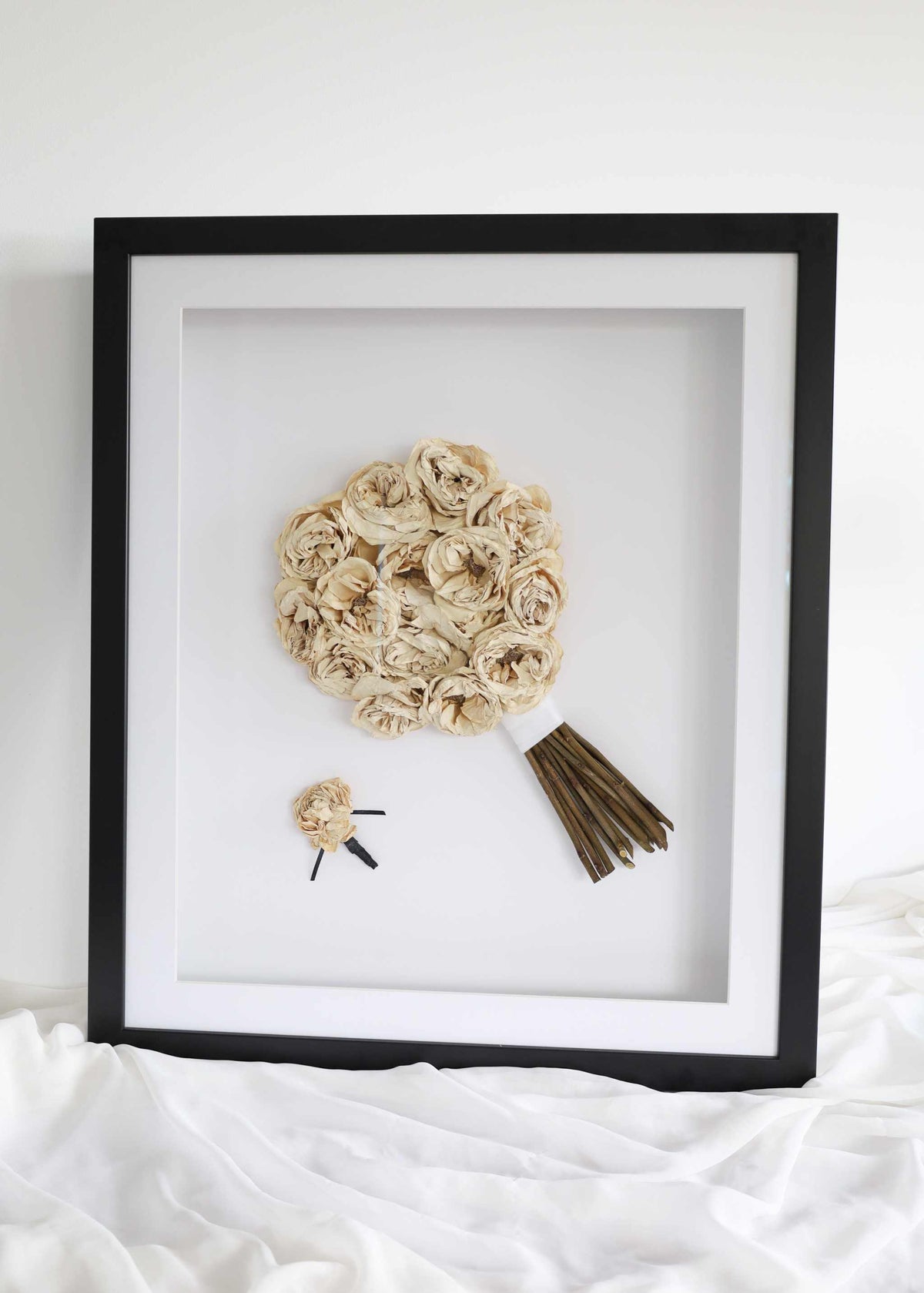 Framed preserved bouquet displayed in custom 60x80 frame with UV protective glass