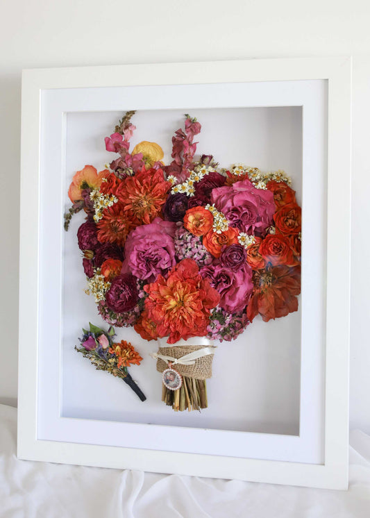 Framed Preserved Bouquet with colourful red, pink, orange and cream flowers in a deep white frame