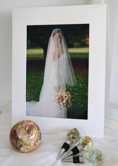 Mini Memories Preservation Package with dried bridal bouquet in resin dome, resin bottle stoppers, and custom framed diamond glitter print