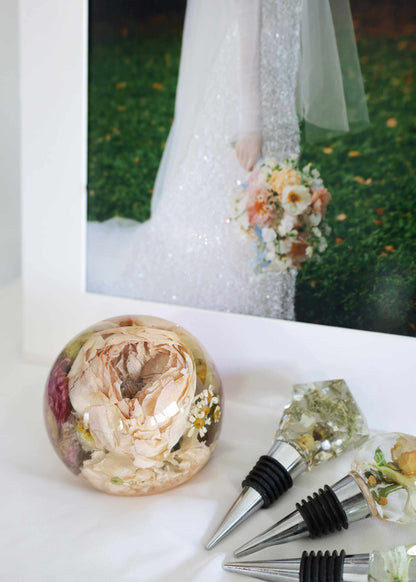 Mini Memories Preservation Package featuring preserved bridal bouquet in resin dome, resin bottle stoppers, and custom diamond glitter print framed display